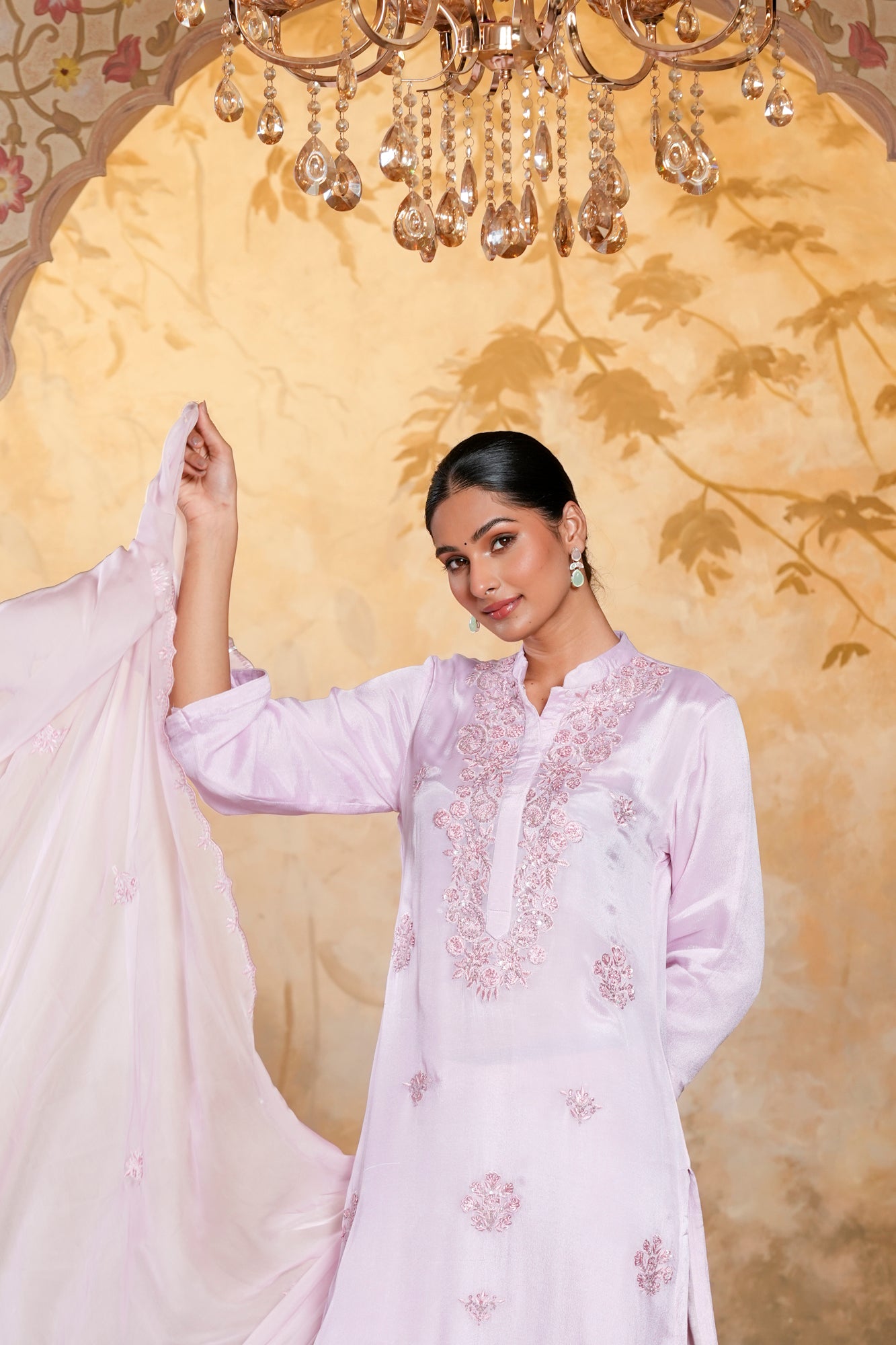 Light pink suit for festive parties