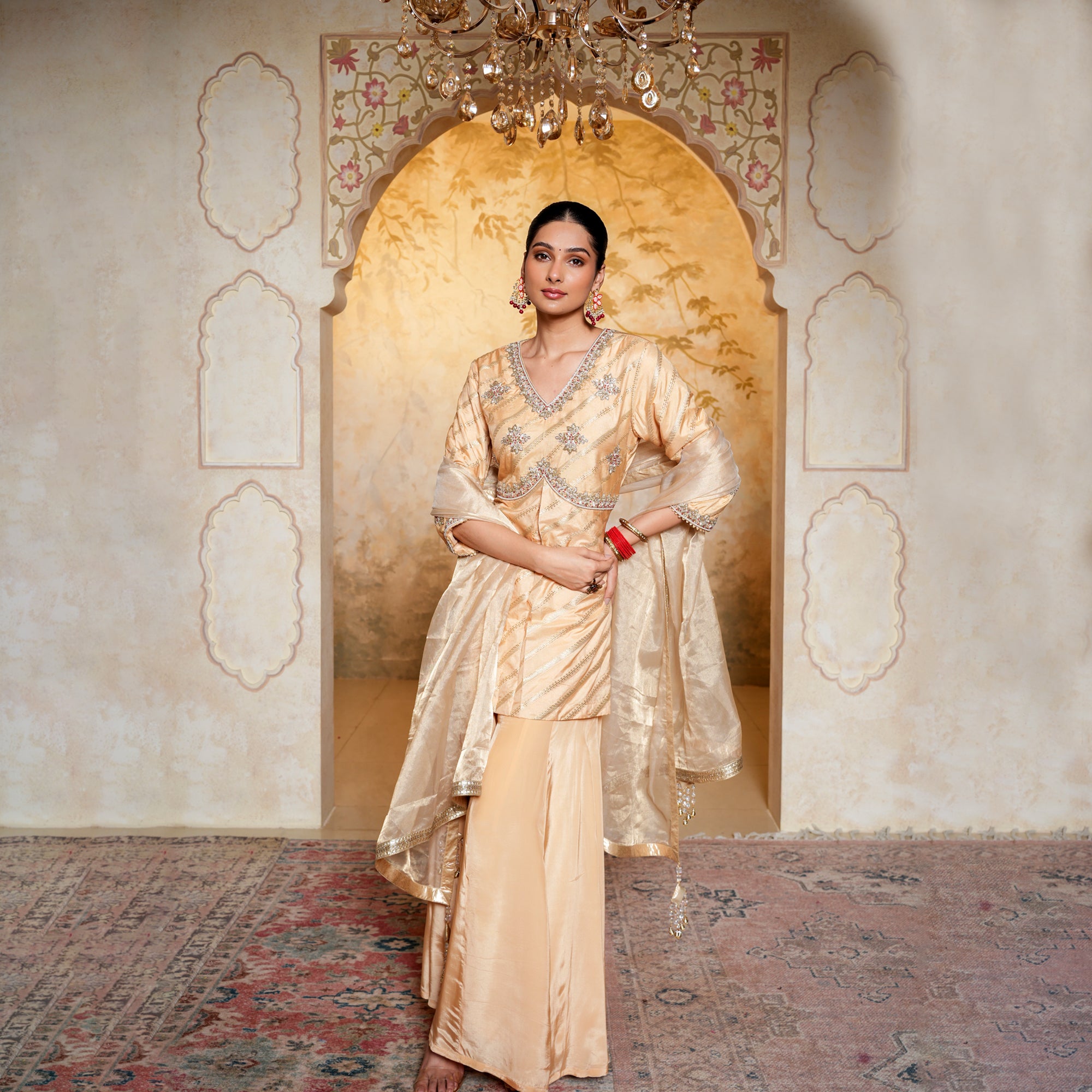 Golden banarsi silk sharara with dabka hand work